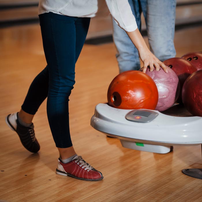 taking-ball-cropped-view-people-bowling-club-ready-have-some-fun